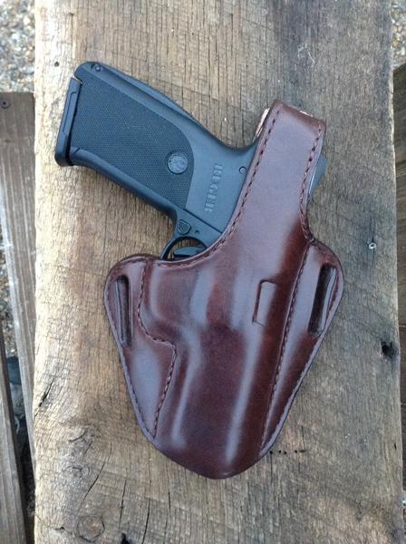 Thumbsnap leather holster for Ruger SR 9 compact pistol.